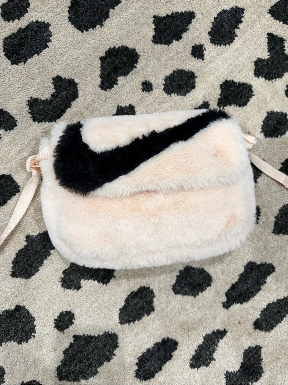 NIKE Plush Crossbody Bag in Blush with Black Accent
